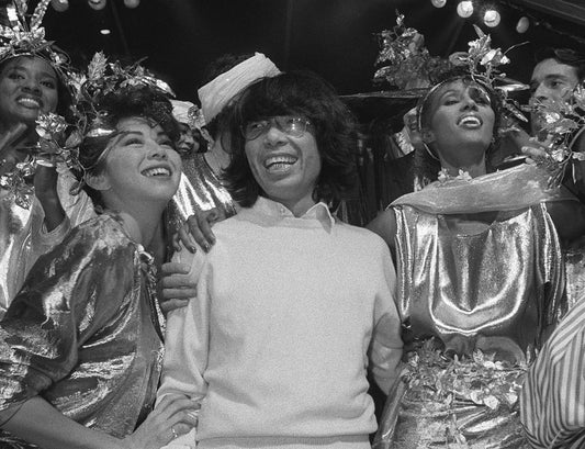 Kenzo at the end of of his Spring-Summer collection showcase on October 19, 1983 at the Château de Maisons-Laffitte in France. Courtesy Pierre Guillaud/ AFP