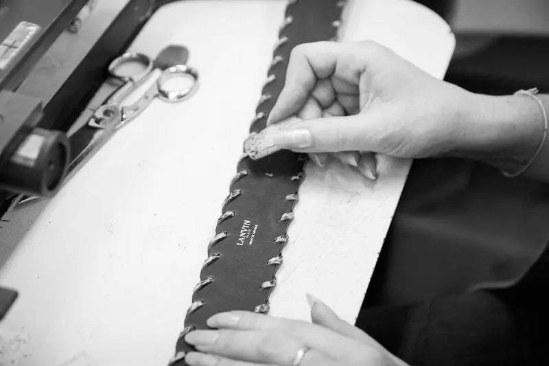 Artisan working on a belt for Lanvin at Maison Edgard Hamon atelier in Paris