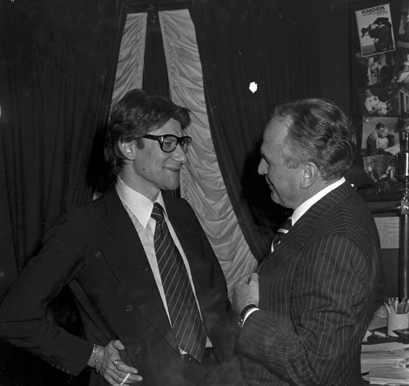 Designer Yves Saint Laurent and Gustav Zumsteg. (Photo by Guy Marineau/WWD/Penske Media via Getty Images)